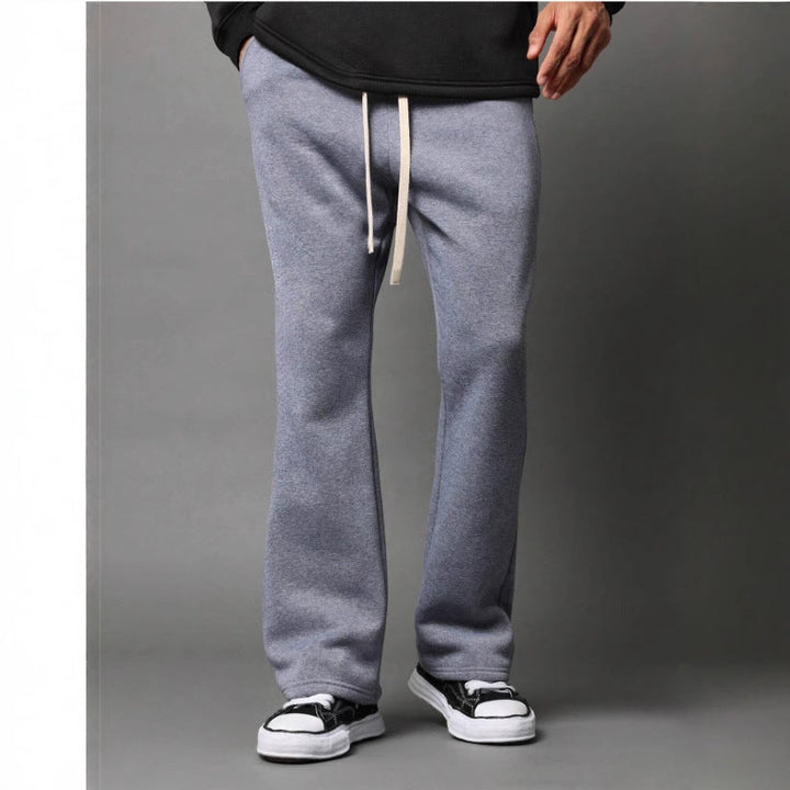 Cozy men's flared sweatpants with drawstring, ideal for loungewear, casual pants, or relaxed everyday comfort.