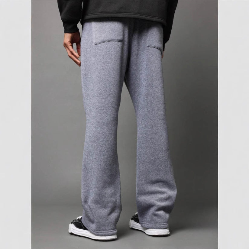 Men's relaxed fit flared sweatpants, comfortable bottoms for a modern athleisure and casual style.