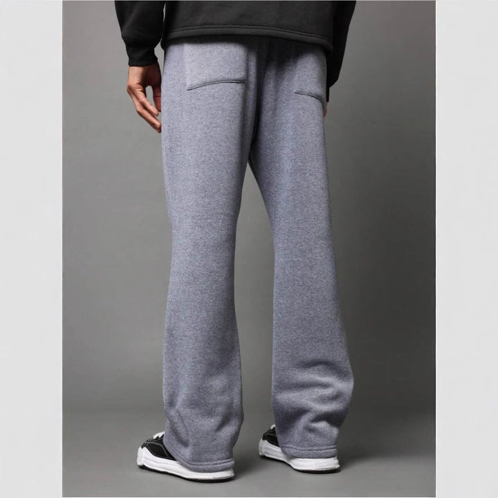 Men's relaxed fit flared sweatpants, comfortable bottoms for a modern athleisure and casual style.