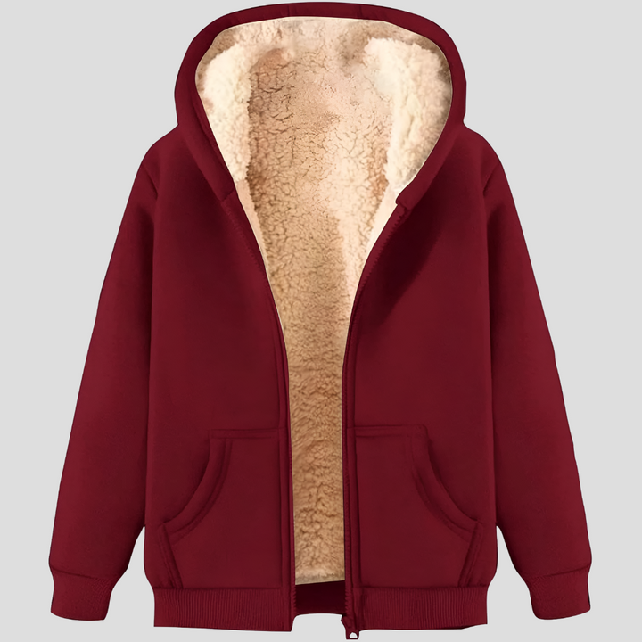 Detailed shot of pocket on a men's fleece-lined winter zip-up hoodie, practical casual jacket