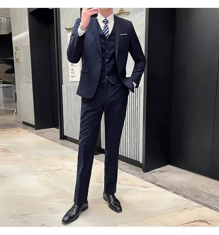 Stylish men's formal business suit, three-piece with notch lapel. Great for office & events.
