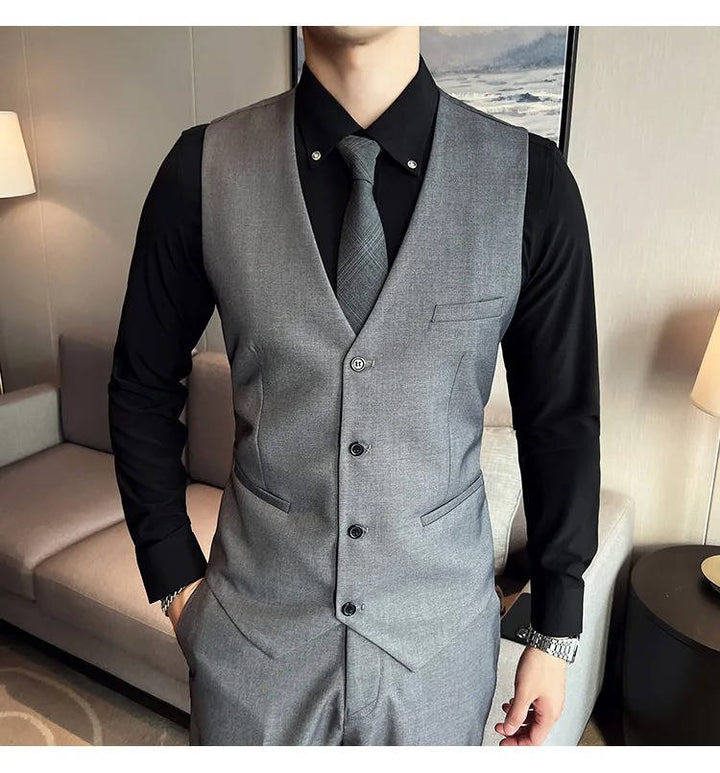 Elegant men's tailored three-piece suit, notch lapel. Ideal for formal wear & special occasions.