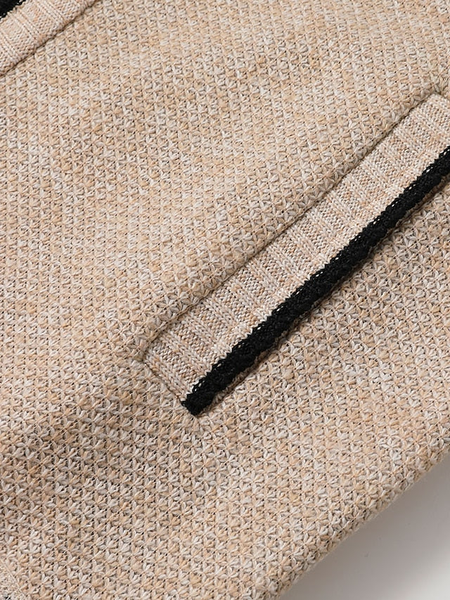 Men's stylish full-zip cardigan with a prominent plaid pattern accent on the collar and shoulders.