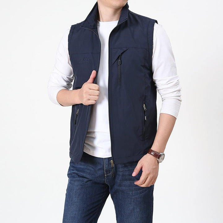 Casual men's full zip vest, a comfortable and versatile lightweight layering piece for everyday wear.