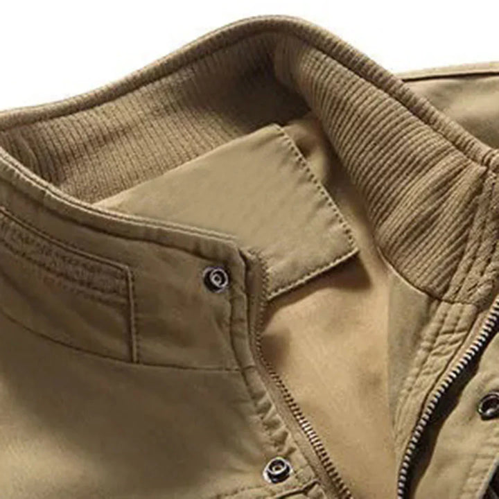 Durable men's travel vest with many pockets, a comfortable and functional sleeveless jacket for adventurers.