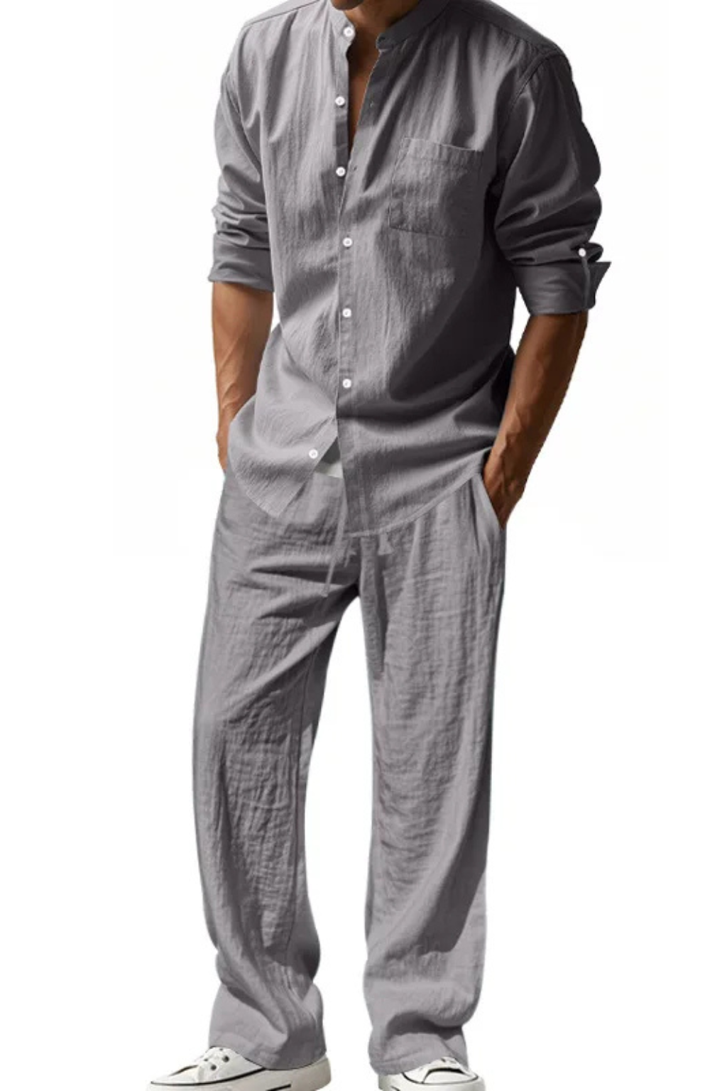 Model wearing men's grandad collar long sleeve shirt & trousers outfit, perfect for spring casual wear.