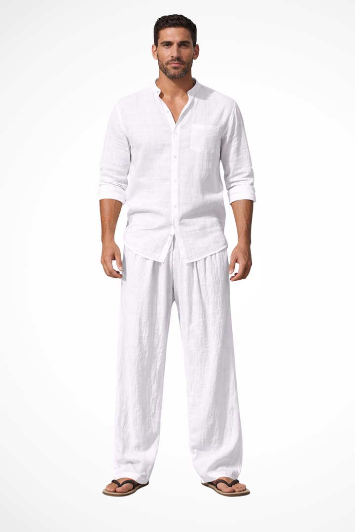 Relaxed fit men's two-piece outfit featuring a grandad collar long sleeve shirt and casual trousers.