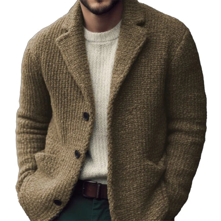 Close-up of a men's regular fit knit cardigan texture, showing button detail and quality yarn