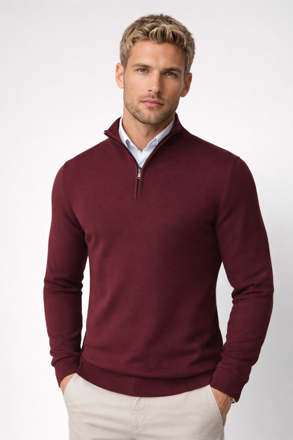 Close-up of the textured knit on a men's half-zip high-neck sweater, highlighting quality.