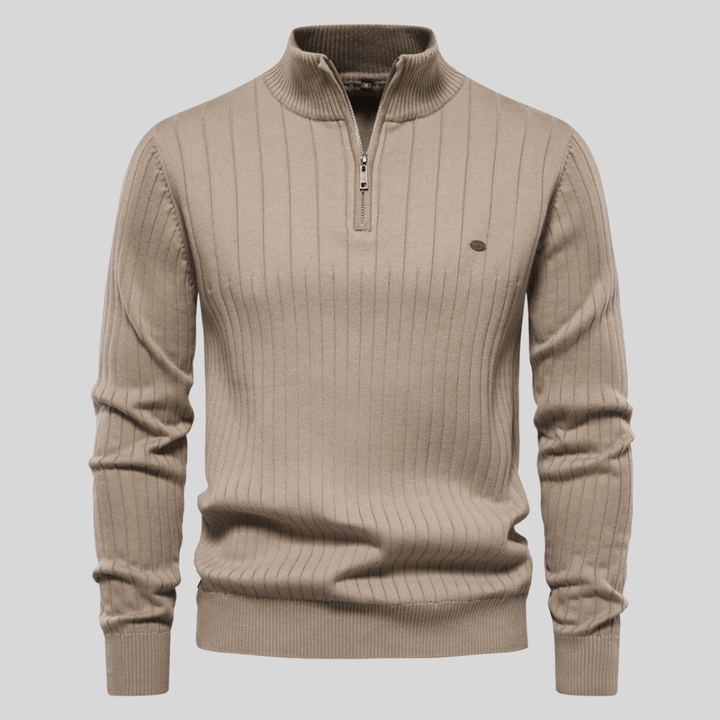 Close-up of men's half-zip ribbed knit sweater texture, ideal for casual men's apparel.