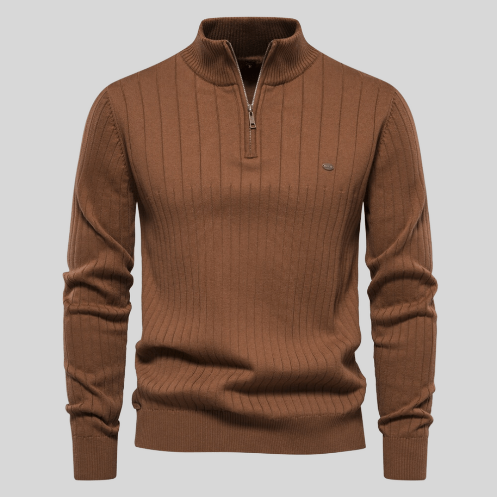 Male model wearing a gray half-zip ribbed knit sweater, showcasing men's spring fashion.