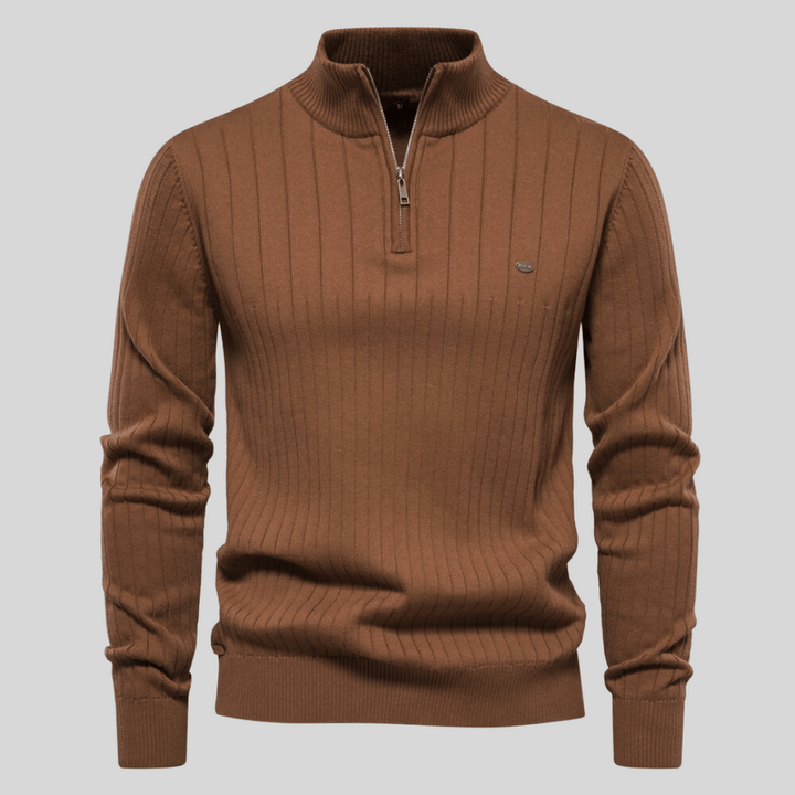 Male model wearing a gray half-zip ribbed knit sweater, showcasing men's spring fashion.