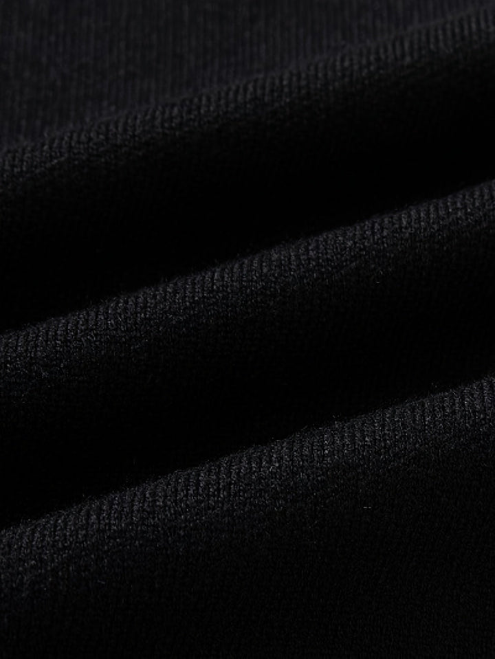 Side view of a men's handcrafted button-front cardigan, emphasizing its comfortable, regular fit.