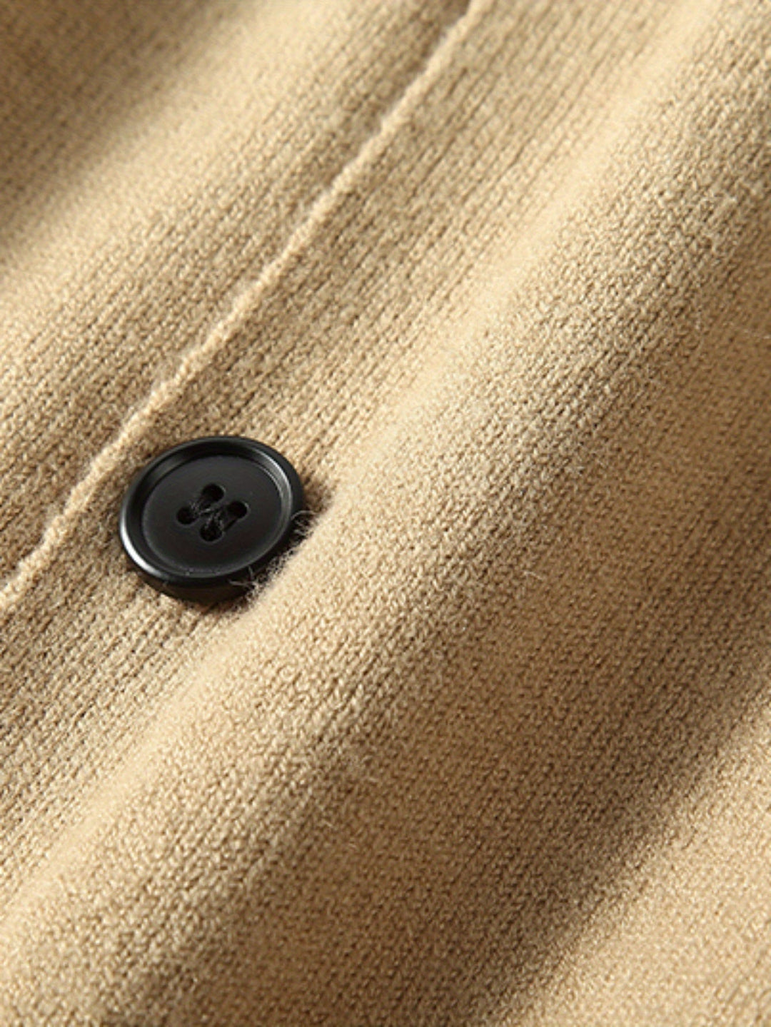 Elegant men's button-front cardigan, a comfortable and versatile top for layering or casual wear.
