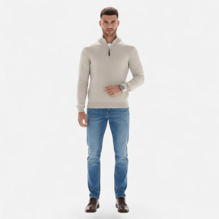 Close-up: Men's heritage half-zip sweater, highlighting refined vertical bar design & comfortable knit.