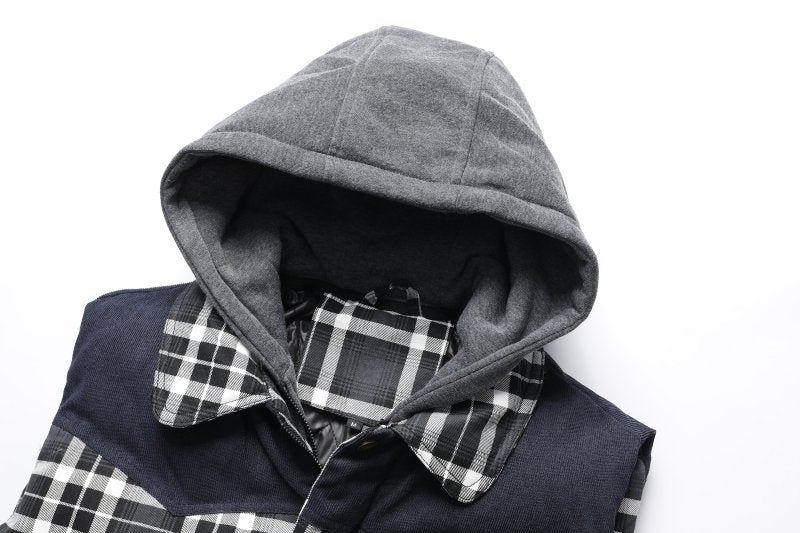 Man in warm hooded plaid puffer vest, great for stylish winter outdoor wear.