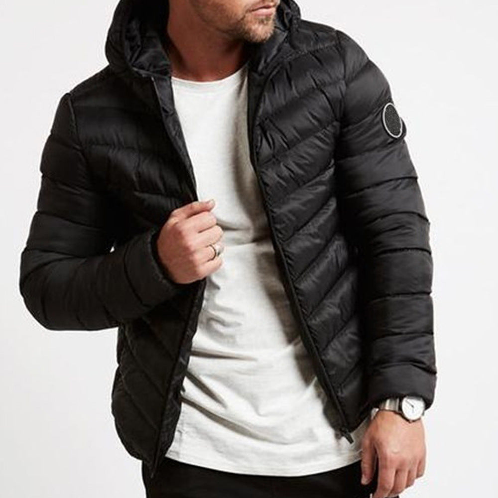 Black men's hooded puffer jacket, perfect for ultimate warmth & urban style. Quilted winter coat.