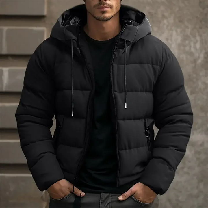 Durable men's hooded quilted puffer jacket. Warm winter coat for outdoor adventures.