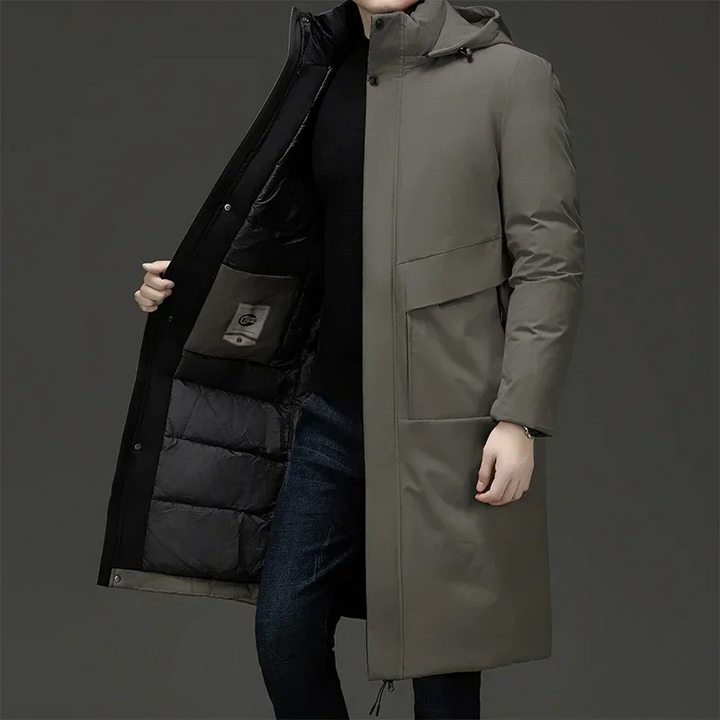 Men's insulated long winter coat with hood, providing warmth & style for cold weather outerwear.