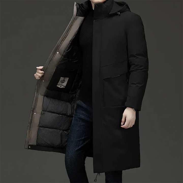Stylish men's hooded long coat, perfect for modern winter fashion and casual cold-weather outfits.