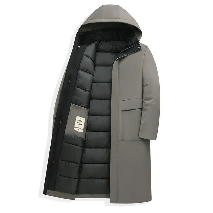 Man wearing a casual men's long hooded winter coat, ideal for daily wear and cold weather activities.