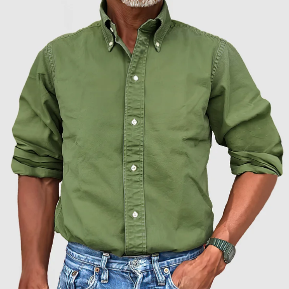 Stylish blue wrinkle-resistant men's long-sleeve shirt, ideal for smart casual ensembles.