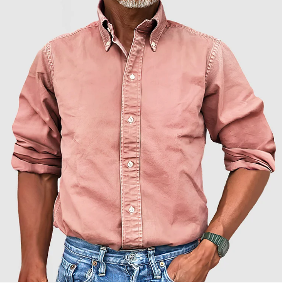 Crisp white wrinkle-resistant men's long-sleeve shirt, essential for a polished, versatile look.