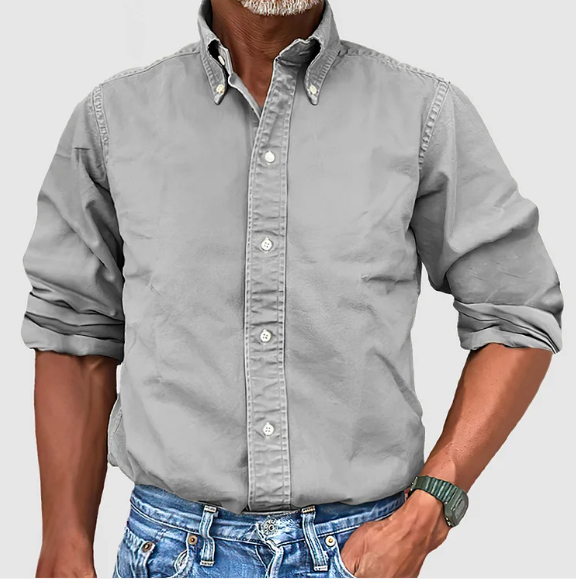 Front view of a men's long-sleeve wrinkle-resistant casual shirt in a solid khaki color.