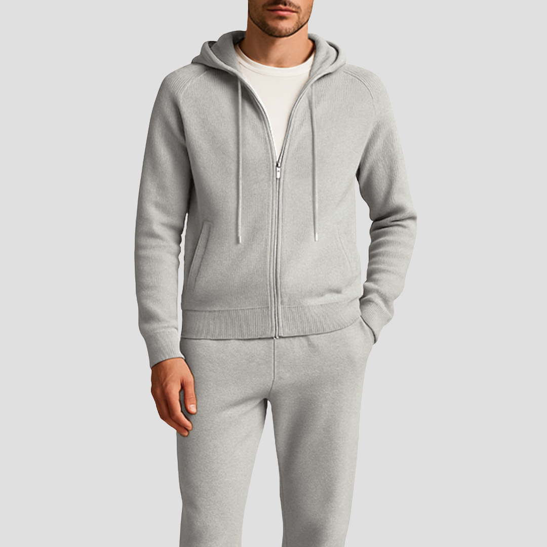 Comfortable men's knit lounge set: a zip-up hoodie and jogger pants. Ideal for relaxing or light athletic activities.