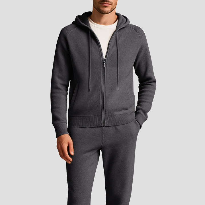Men's casual knit tracksuit with a hooded zip-up jacket and tapered jogger bottoms. Versatile sportswear.