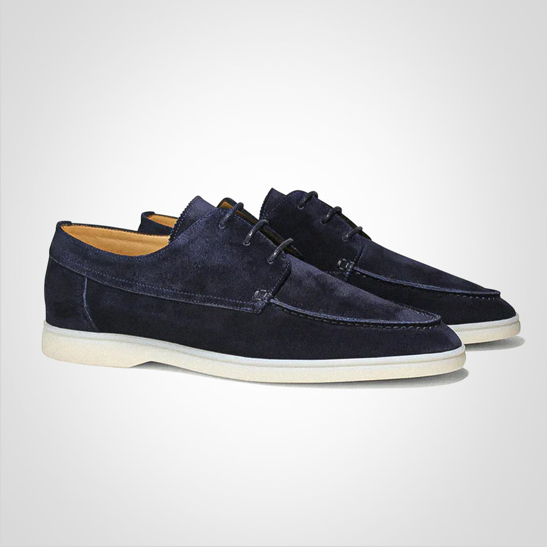 Stylish men's dark blue lace-up boat shoes, perfect casual footwear for summer fashion.