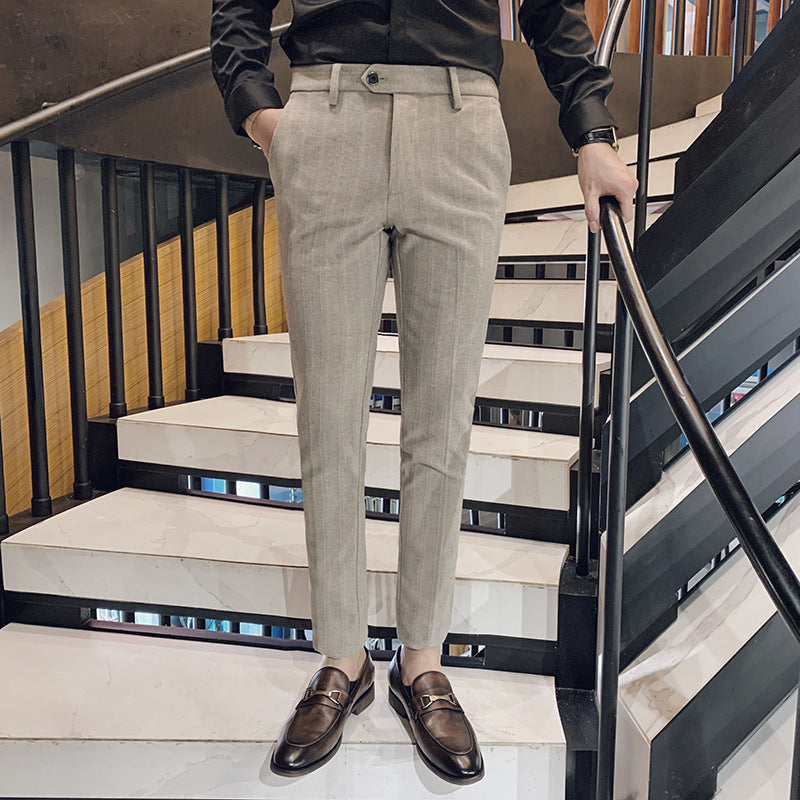 Lawson men's slim-fit tailored dress pants in herringbone fabric, versatile for office or events.