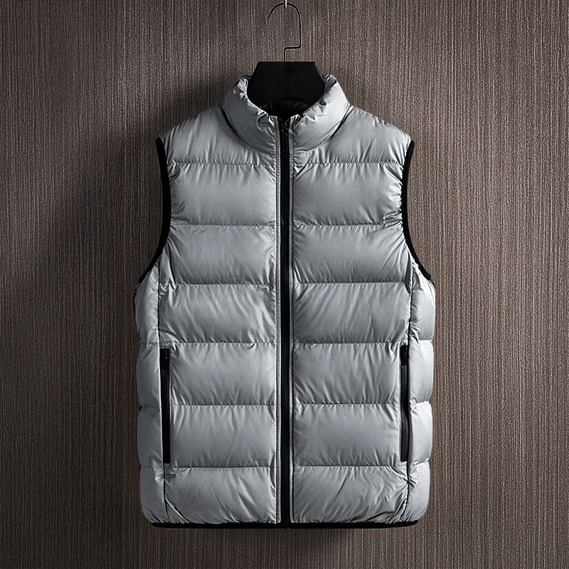 Men's lightweight black puffer vest, ideal for layering in cold weather. Casual and outdoor style.