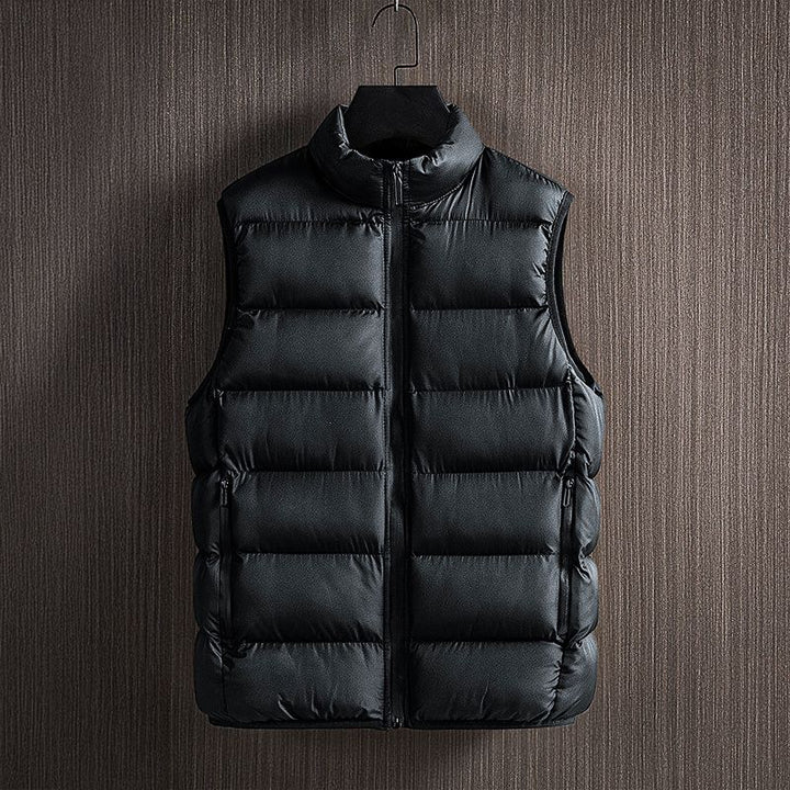 Men's sleeveless puffer vest for layering. Lightweight winter vest for outdoor adventures & everyday warmth.