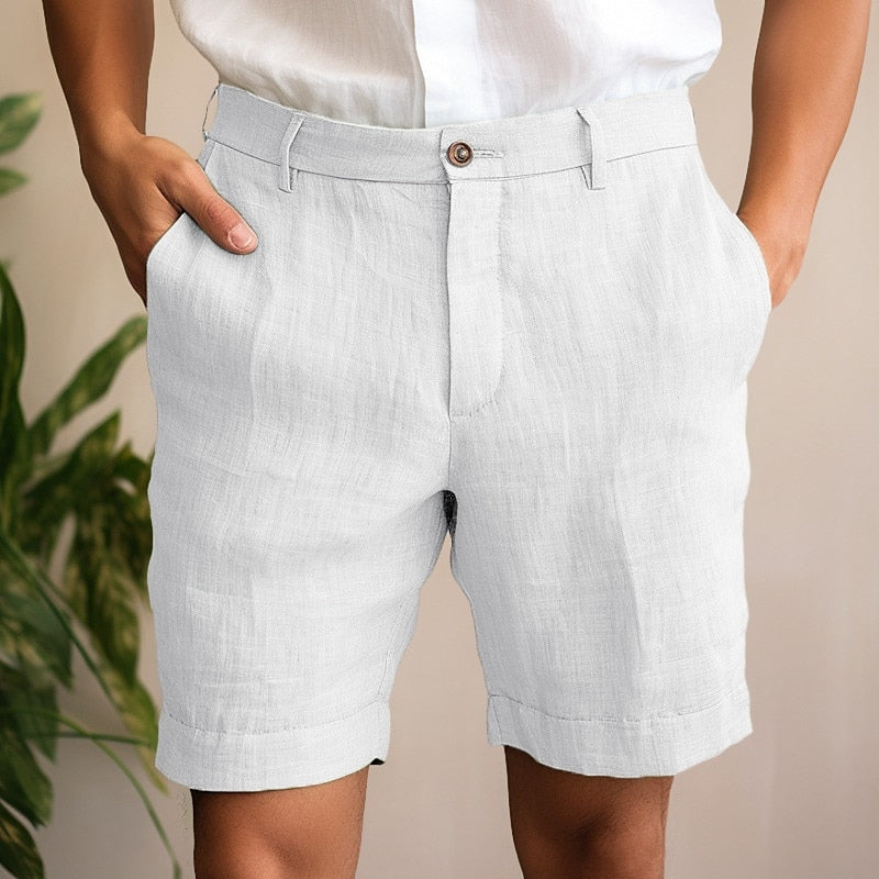 Model wearing men's comfortable chino shorts, showcasing knee-length fit for summer & casual style.