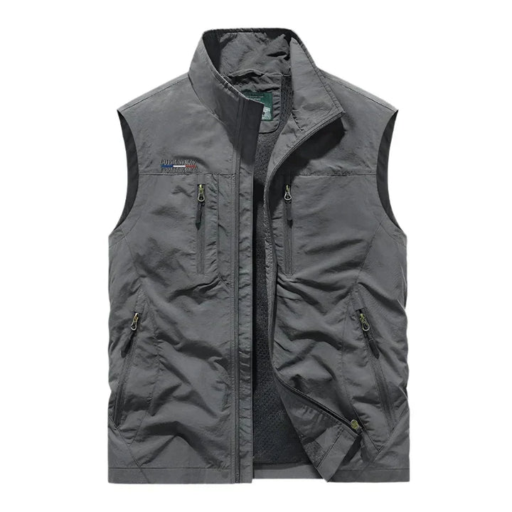 Durable men's sleeveless lightweight vest with full zip closure, great for outdoor activities & fall adventures.