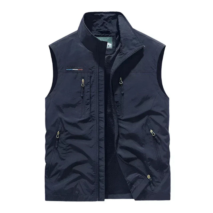 Versatile men's full zip vest, lightweight & sleeveless, excellent for outdoor layering, casual spring & fall wear.