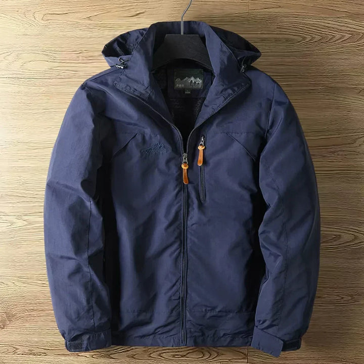 Durable men's waterproof rain jacket with hood, lightweight design offers protection & comfort for any weather.