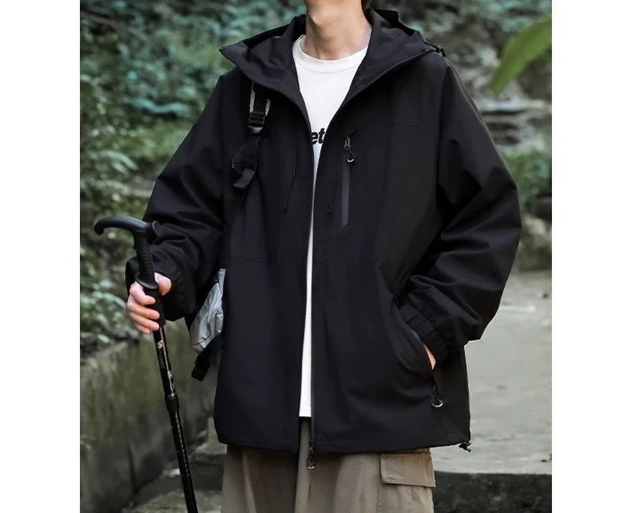 Men's lightweight hooded windbreaker jacket in blue, perfect for hiking and outdoor activities.