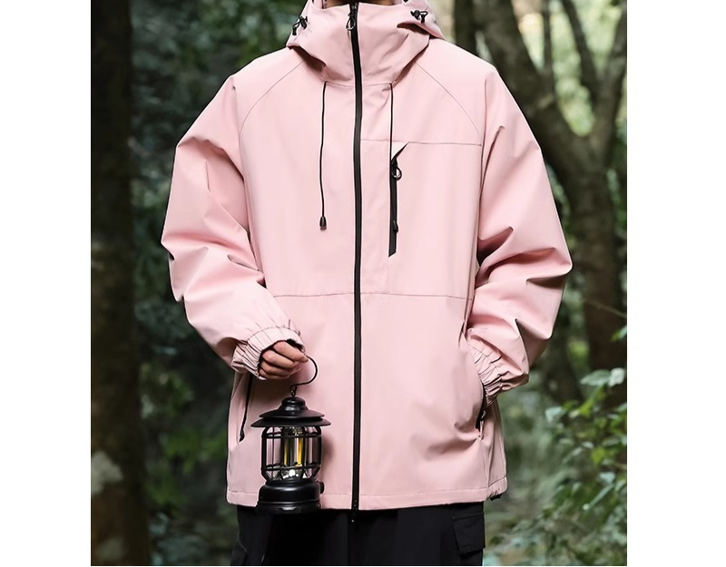 Athletic men's travel windbreaker with hood, breathable and suitable for various climates.