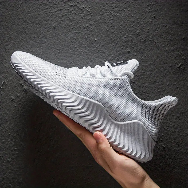 Men's lightweight lace-up athletic sneakers with a sculpted sole for active comfort and versatile style.