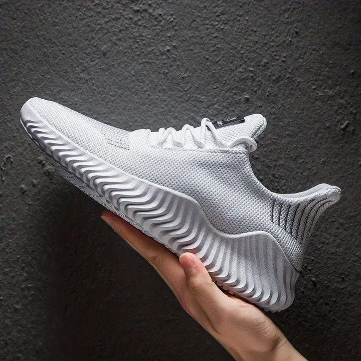 Men's lightweight lace-up athletic sneakers with a sculpted sole for active comfort and versatile style.
