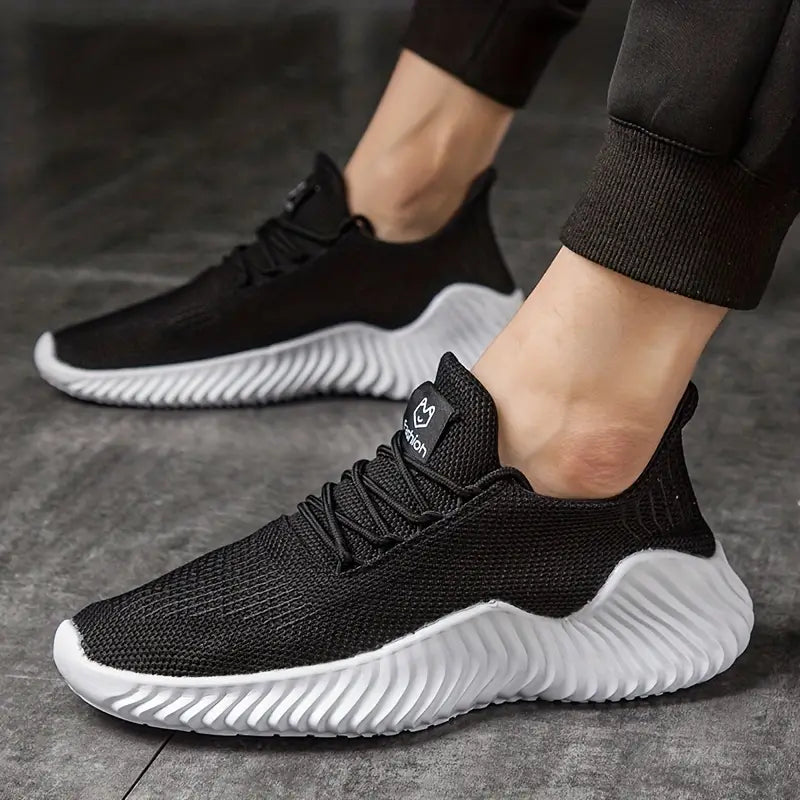 Men's lightweight lace-up athletic sneakers featuring a unique sculpted sole, perfect for active comfort.