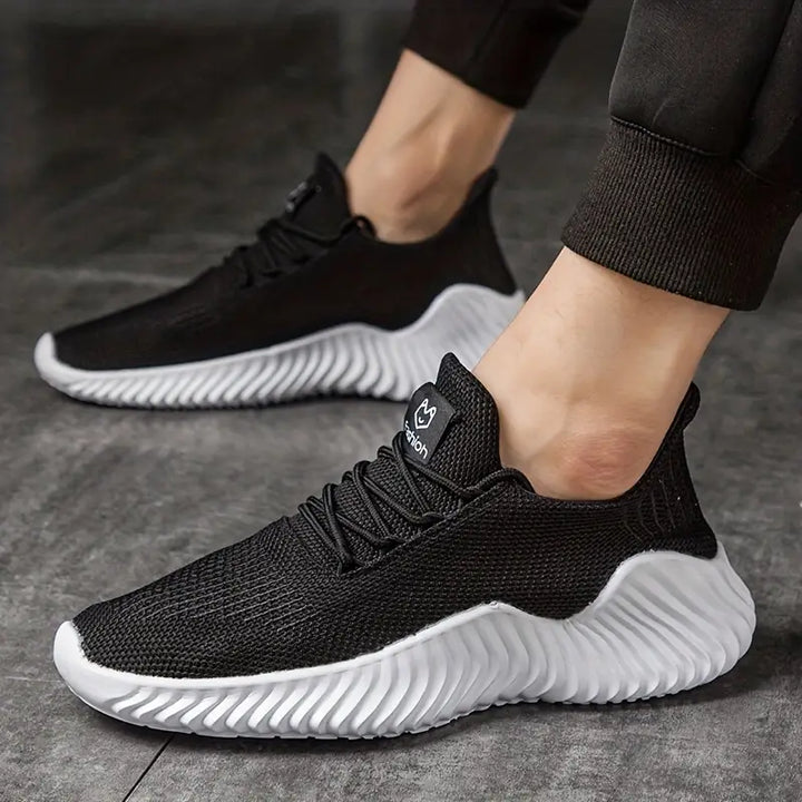 Men's lightweight lace-up athletic sneakers featuring a unique sculpted sole, perfect for active comfort.