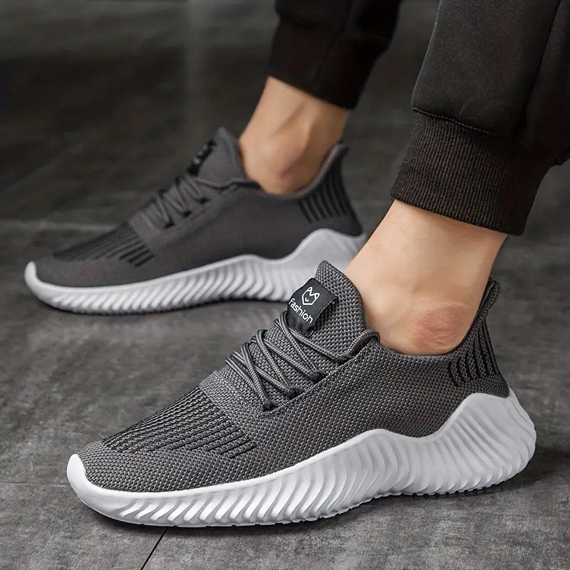 Breathable men's lightweight sneakers with a secure lace-up fit, designed for active comfort and support.