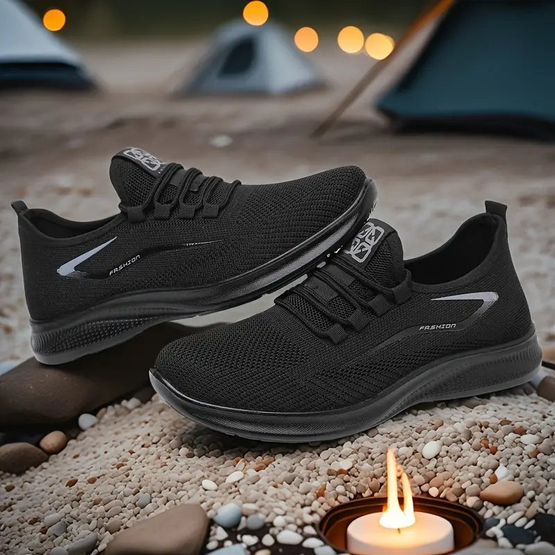 Athletic casual men's footwear, these lightweight lace-up sneakers offer breathable comfort & modern style.