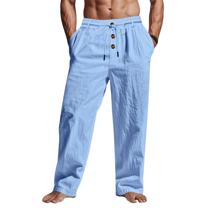 Close-up of the drawstring waist on men's relaxed-fit linen pants, ideal for beachwear.