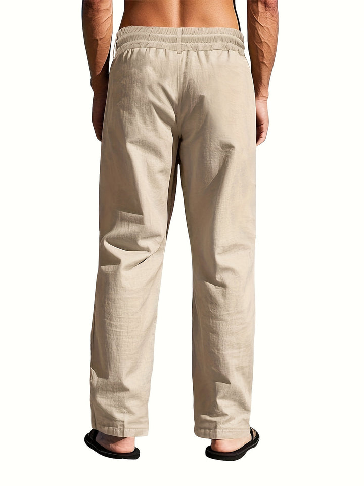 Men's summer beachwear: lightweight linen pants with adjustable drawstring waist and relaxed fit.