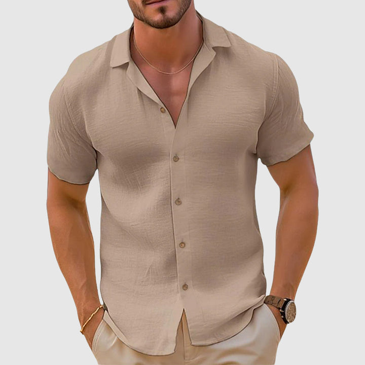 Men's lightweight linen short sleeve button up shirt in white, perfect for summer casual wear.