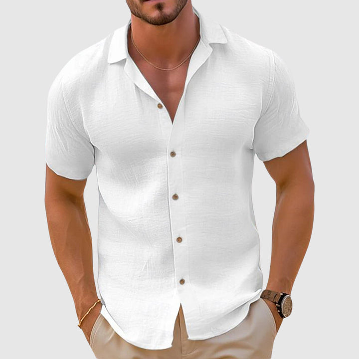 Casual men's short sleeve button up shirt made from lightweight linen, great for warm weather.